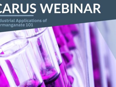 Text reading "CARUS WEBINAR: Industrial Applications of Permanganate 101" over a background image of test tubes filled with a purple liquid.